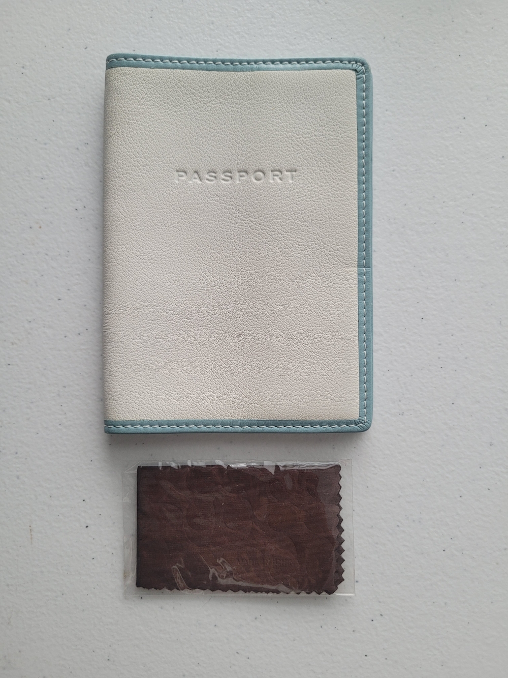 Coach - Off White and Light Blue Trim Passport Holder and Glasses Fabric Wipe